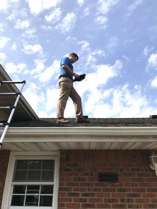 Licensed Home Inspector on the roof